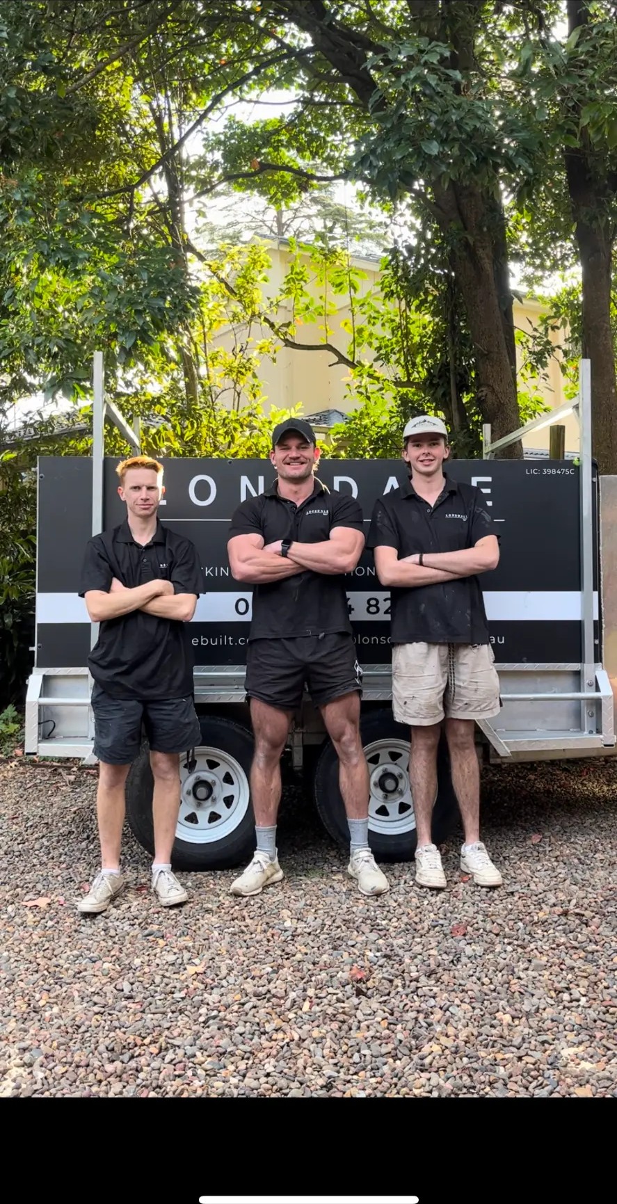 The Lonsdale Building team on site with the branded trailer